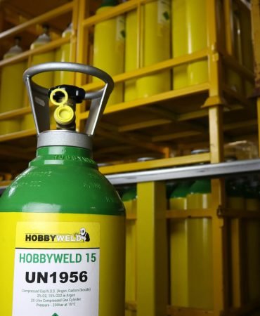 Green gas cylinder labeled HOBBYWELD 15.