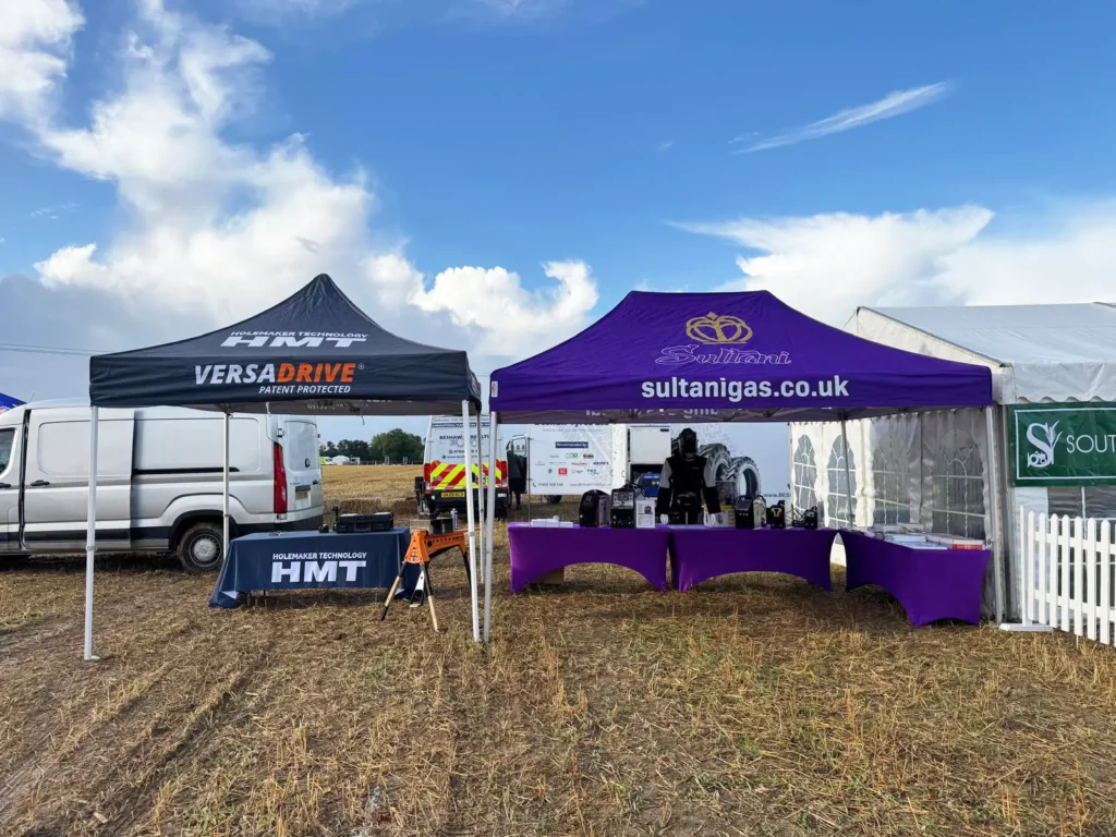 Two vendor tents at an outdoor event.