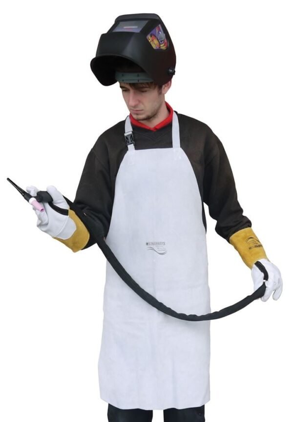 Welder preparing equipment with protective gear on