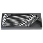 Set of chrome wrenches in a storage tray.