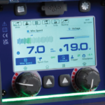 Display panel showing wire speed and voltage settings.