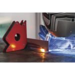 Close-up of welding process with sparks flying.