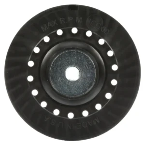 Black circular disc with holes and central hole.