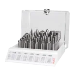 Set of metal cutting tools in clear box.