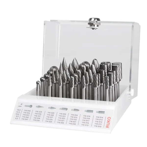 Set of metal cutting tools in clear box.