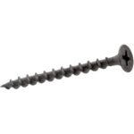 Close-up of a black metal screw.