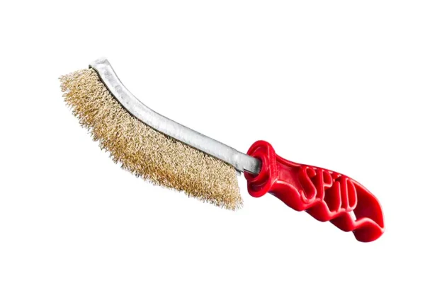 Wire brush with a red handle.