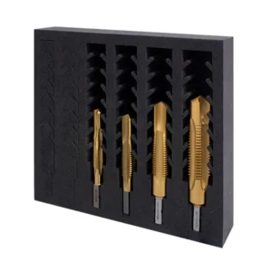 Set of gold-coated cutting tools in organizer