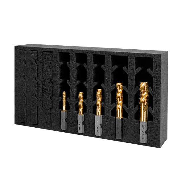 Set of various machine drill bits in holder