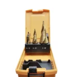 Set of step drill bits in an orange case.