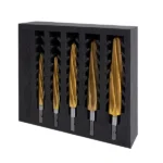 Five metal drill bits in a storage tray.