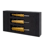 Three gold cutting tools in protective foam case.