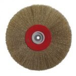 Gold wire brush wheel for cleaning and polishing.