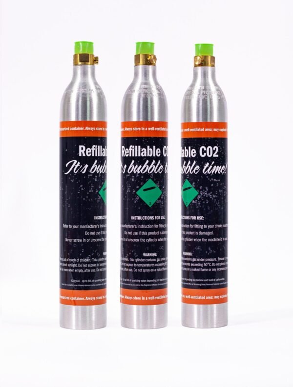 Three refillable CO2 cylinders for beverages.