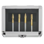 Four gold-tipped nail drill bits in a case.