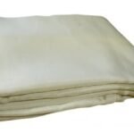 Stack of folded, cream-colored fabric sheets.