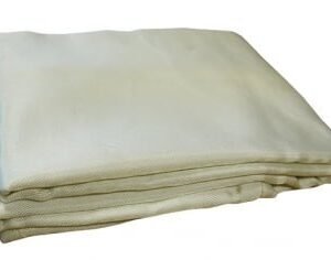 Stack of folded, cream-colored fabric sheets.