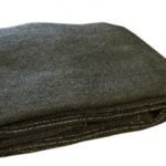 Folded gray cloth fabric on a white background.