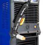 Close-up of welding torch on machine.