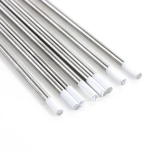 Set of metallic rods with white tips.