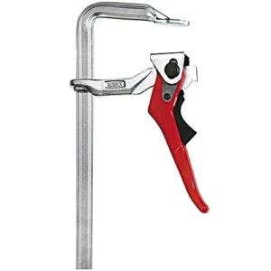 Metal clamp tool with red handle and trigger.