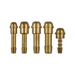 Five brass components of varying sizes.