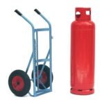 Blue hand truck beside a red gas cylinder.