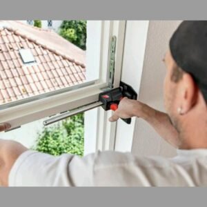 Person adjusting window using a tool
