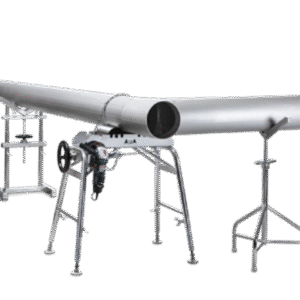 Metal pipe setup with support stands and equipment.