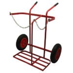 Red cart with wheels and handles for transport.