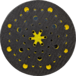 Circular textured surface with holes and yellow accents