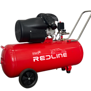 Red air compressor with wheels and motor.