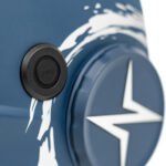 Close-up of a blue device with a grind button.